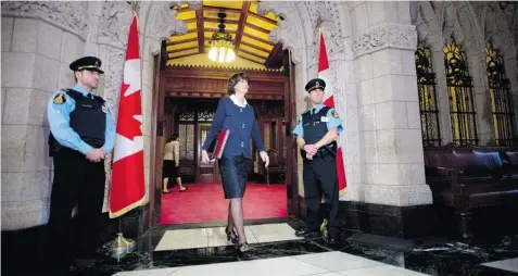  ?? SEAN KILPATRICK/The Canadian Press ?? Conservati­ve Marjory LeBreton leaves the Senate on Parliament Hill in Ottawa on Thursday. The former house leader launched a counter-attack against
Mike Duffy’s allegation­s that she was part of a coverup involving the Prime Minister’s Office and...