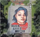  ?? JULIO CORTEZ/AP ?? A ground mural depicts Breonna Taylor in Annapolis, Md.