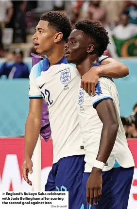  ?? Clive Brunskill ?? England’s Bukayo Saka celebrates with Jude Bellingham after scoring the second goal against Iran