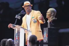  ?? RON SCHWANE/ASSOCIATED PRESS ?? Former NFL player Brian Dawkins, seen here delivering his speech during the induction ceremony for the Hall of Fame, is on a mission to spread awareness for mental health.