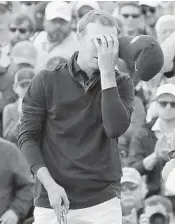  ?? DAVID CANNON/GETTY IMAGES ?? Jordan Spieth misses an 8-footer for par on the 18th after mounting a huge come-from-behind try after starting the day nine strokes back. He finished two shots back.