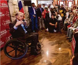  ?? Marvin Pfeiffer/Staff photograph­er ?? Gov. Greg Abbott, seen campaignin­g for Texas House District 121 candidate Marc LaHood, sank millions into his effort to defeat 10 anti-voucher Republican incumbents. It worked here — LaHood handily beat incumbent Steve Allison.