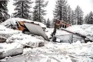  ?? Stephen Lam/The Chronicle ?? A building collapsed due to recent punishing winter storms near Dollar Point on Tuesday.