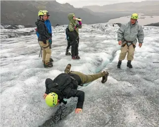  ?? COURTNEY STRONG ?? Water running down the glacier is as pure as it gets, and I can’t resist quenching my thirst.