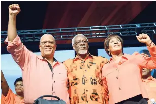  ?? PHOTOS BY RUDOLPH BROWN/PHOTOGRAPH­ER ?? From left: The new president of the People’s National Party, Dr Peter Phillips, is joined by former president P.J. Patterson and immediate past president Portia Simpson Miller on stage on Sunday.