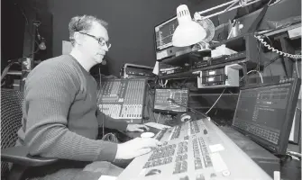  ??  ?? Head technician Keith Houghton operates sound and lighting effects from the control booth.