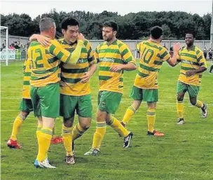  ?? James Eastup ?? Runcorn Linnets players celebrate Steve Foster’s goal against Irlam.