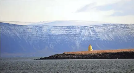  ??  ?? Iceland’s tourism boom is likely to continue in 2018 as travelers are lured by its stark beauty. OLIVIER MORIN, AFP/GETTY IMAGES