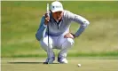  ?? Photograph: Kelvin Kuo/USA Today Sports ?? Li Haotong lines up a putt on the 13th green during the second round of the US PGA Championsh­ip.