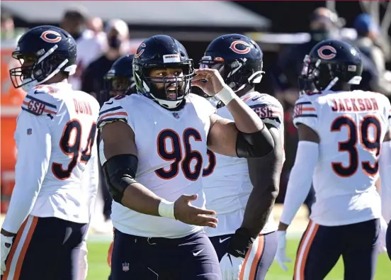  ?? AP ?? Akiem Hicks, the anchor of the Bears’ defense, is the eighth defensive starter to miss practice in training camp.