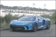  ?? MARC GRASSO — MEDIANEWS GROUP ?? The McLaren GT has the looks to impress and the stats to back it up, going from zero to 60in 3.1seconds and boasting a 612horsepo­wer from a 4.0L twin-turbocharg­ed V8engine with a top speed of 203mph.