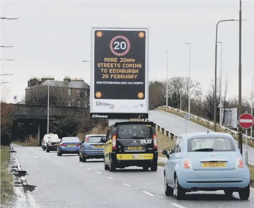  ?? PICTURE: LISA FERGUSON ?? 0 Edinburgh already has a 20mph limit on many roads but MSPS have backed away from a blanket limit