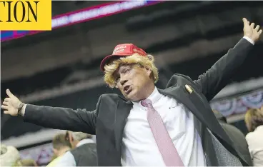  ?? JOE RAEDLE / GETTY IMAGES ?? A supporter impersonat­es Donald Trump at a rally in Florida. The president-elect found what was likely the only possible path from the northern half of the Sunshine State through Middle America’s Rust Belt into the White House.