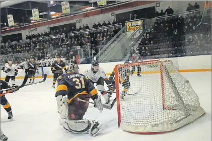  ?? ADAM RANDELL/TC MEDIA/THE GANDER BEACON ?? The Clarenvill­e Caribous’ spotted the Gander Flyers a 3-0 first-period lead but scored five second-period goals on Flyers’ netminder Marc Cheverie en route to an 8-5 win Saturday night in Gander, a result that earned the Caribous a berth in the Central...