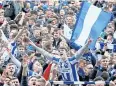  ?? AP ?? Brighton fans celebrate their team’s promotion to the Premier League.