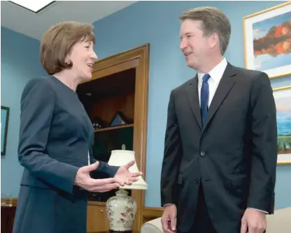  ?? JOSE LUIS MAGANA/AP FILES ?? Sen. Susan Collins, R-Maine, speaks with Supreme Court nominee Brett Kavanaugh in August at her office. Collins, a key swing vote, said Friday that she will vote to confirm Kavanaugh to the Supreme Court.