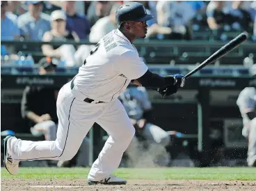  ?? — THE ASSOCIATED PRESS ?? Jean Segura watches his tiebreakin­g RBI single during the eighth inning against the San Francisco Giants on Wednesday in Seattle.