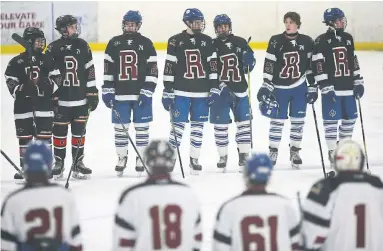  ?? VINCE TALOTTA/TORONTO STAR ?? At a game in Etobicoke Sunday afternoon, players from both teams changed into jerseys bearing the letter "R" in remembranc­e of Roy Pejcinovsk­i, who was killed last week along with his mother and sister.