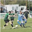  ?? ?? Harvest (blue) won 1-0 at Andover. Picture: Ian Grainger.