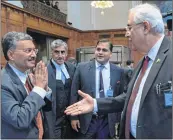  ??  ?? NO, THANK YOU: Pakistan's attorney general Anwar Mansoor Khan greets Deepak Mittal, the joint secretary of India's Foreign Ministry, but the latter refuses to acknowledg­e the shake, preferring a dignified ‘Namaste.’ Khan got some respite when Harish Salve, the former attorney general who is representi­ng India and Jadhav at the ICJ, took his hand.