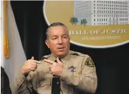  ?? Damian Dovarganes / Associated Press 2020 ?? Los Angeles County Sheriff Alex Villanueva pledged transparen­cy with the state investigat­ion.