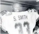  ?? SUN SENTINEL FILE PHOTO ?? In April 1989, Miami picked Sammie Smith No. 9 overall in the draft, but he struggled with fumbling issues. He played for the Dolphins for three seasons and rushed for a total of 1,787 yards.