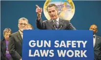  ?? RENÉE C. BYER AP FILE ?? Gov. Gavin Newsom signed SB 2 in September, but continuing legal challenges have prevented it from going into effect.