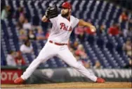  ?? CHRIS SZAGOLA — THE ASSOCIATED PRESS ?? Philadelph­ia Phillies relief pitcher Adam Morgan throws a pitch during the ninth inning of a baseball game against the Atlanta Braves on Aug. 28 in Philadelph­ia.