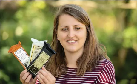  ??  ?? ● Megi Williams from South Caernarfon Creameries is pictured with the new handcrafte­d lines