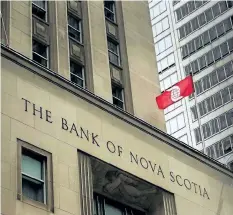  ?? NATHAN DENETTE/ THE CANADIAN PRESS ?? The Bank of Nova Scotia building is shown in the financial district in Toronto on Aug. 22, 2017. Scotiabank has signed a deal to buy investment manager Jarislowsk­y Fraser for $ 950 million.
