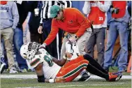  ?? AP ?? Miami wide receiver Ahmmon Richards got up after this play Saturday at Pittsburgh, but he injured the meniscus in his left knee during practice Wednesday in Coral Gables.