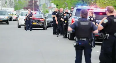  ?? Picture: AFP ?? ‘HATE CRIME’. Buffalo Police at a Tops Friendly Market on Saturday in Buffalo, New York. According to reports, at least 10 people were killed in a mass shooting at the store.