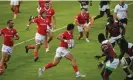  ?? Dokoupil/World Rugby/Getty Images ?? Tomas Appleton of Portugal runs with the ball against Kenya. Photograph: Martin