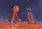  ??  ?? Miguel (voiced by Anthony Gonzalez) and his loyal dog Dante are still leading the movie pack with “Coco.” PIXAR