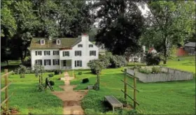  ?? DIGITAL FIRST MEDIA FILE PHOTOS ?? The ironmaster’s house and herb garden at Hopewell Furnace National Historic Site.