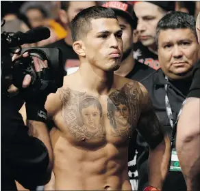 ??  ?? Three months after ending a lengthy injury absence with his first title defence, UFC lightweigh­t champ Anthony Pettis was back at UFC 185 on Saturday night in Dallas.