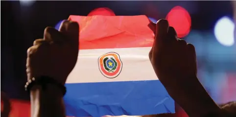  ?? (Reuters) ?? COMING TO Jerusalem, the Paraguayan flag.