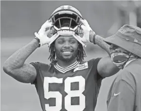  ?? MARK HOFFMAN/MILWAUKEE JOURNAL SENTINEL ?? Christian Kirksey was smiling during training camp but has experience­d an uneven first season in Green Bay.