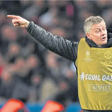  ?? Picture: Getty. ?? Ole Gunnar Solskjaer speaks with assistant Michael Carrick in Paris.