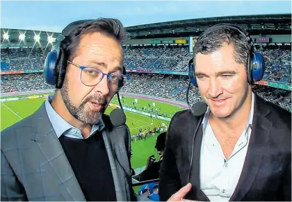  ??  ?? Spark Sport commentato­rs Scotty Stevenson and former All Black Stephen Donald.