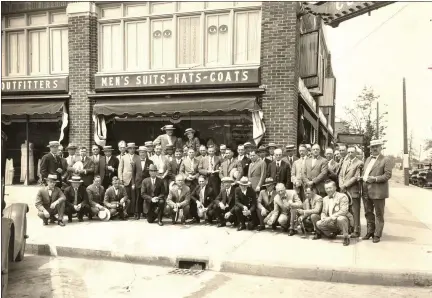  ?? PHOTOS COURTESY OF ROYAL OAK HISTORICAL SOCIETY MUSEUM ?? Employees of Codlings men’s store at Third and Main Streets in downtown Royal Oak in the 1920s after the public voted to make the community a city in 1921. The site later became a bank building and is now a Starbucks Coffee.