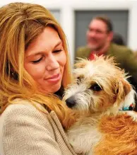  ??  ?? Animal lover: Carrie Symonds with Dilyn