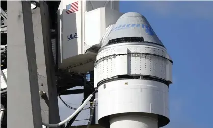  ?? Photograph: Terry Renna/AP ?? Boeing’s first Starliner spacecraft on top of a United Launch Alliance Atlas 5 rocket.