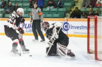  ?? CITIZEN PHOTO BY JAMES DOYLE ?? Prince George Cougars forward Vladislav Mikhalchuk goes one-on-one against Vancouver Giants goaltender David Tendeck on Wednesday night at CN Centre.