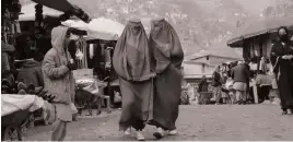  ?? AFP ?? We should look to the women of Afghanista­n as a lesson of what must not happen, and continue to support them
Afghan women at a market at Fayzabad district, in Badakhshan province