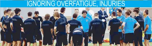  ?? REUTERS ?? Croatia coach Zlatko Dalic talks to the players during training.