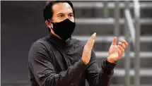  ?? CHRIS O'MEARA AP ?? ‘This is a challenge for everybody,’ Heat coach Erik Spoelstra says of additional measures restrictin­g teams while on the road.