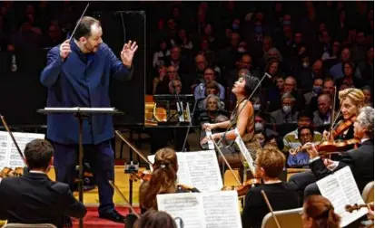  ?? WINSLOW TOWNSON ?? Andris Nelsons led the BSO and pianist Yuja Wang Thursday at Symphony Hall.