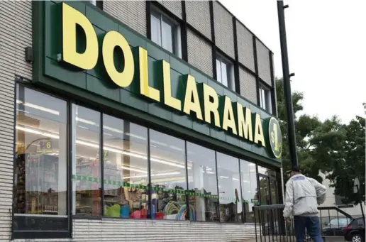  ?? PAUL CHIASSON/THE CANADIAN PRESS FILE PHOTO ?? Dollarama said it will begin accepting credit cards in a test market in B.C., after beginning to accept payment via debit cards in 2008.