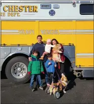  ?? SUBMITTED PHOTO ?? Tony and Pamela Boulos and their children Lucas, Andreas, and Melina along with their family dogs, Fox, and Lily at the Fame Fire Co.